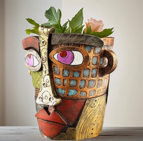 Yhupl handcrafted planter showcases artisan detail and one-of-a-kind charm.