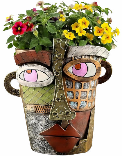Yhupl Picasso face planter with drainage holes for healthy plant roots.