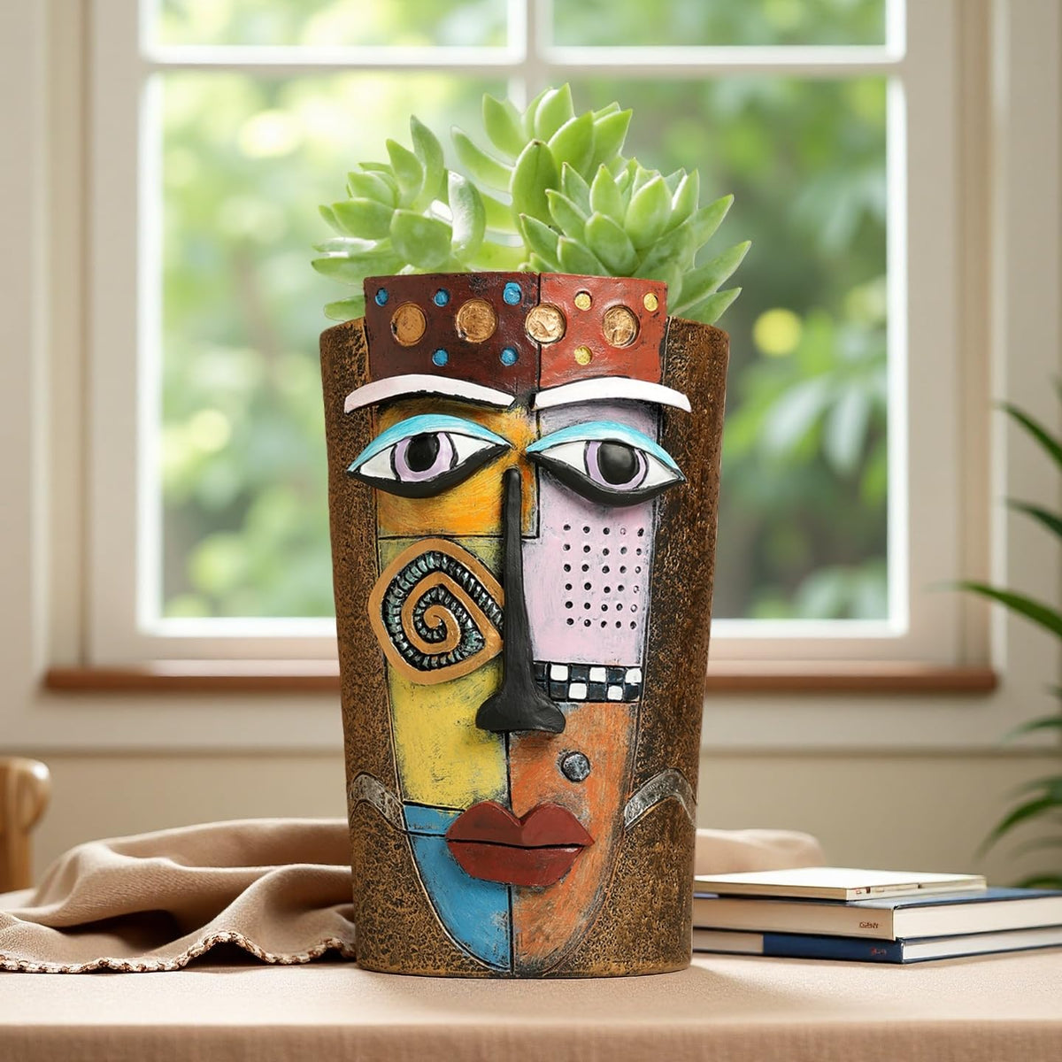 Yhupl Picasso face pot with plant demonstrates versatile decor for small spaces