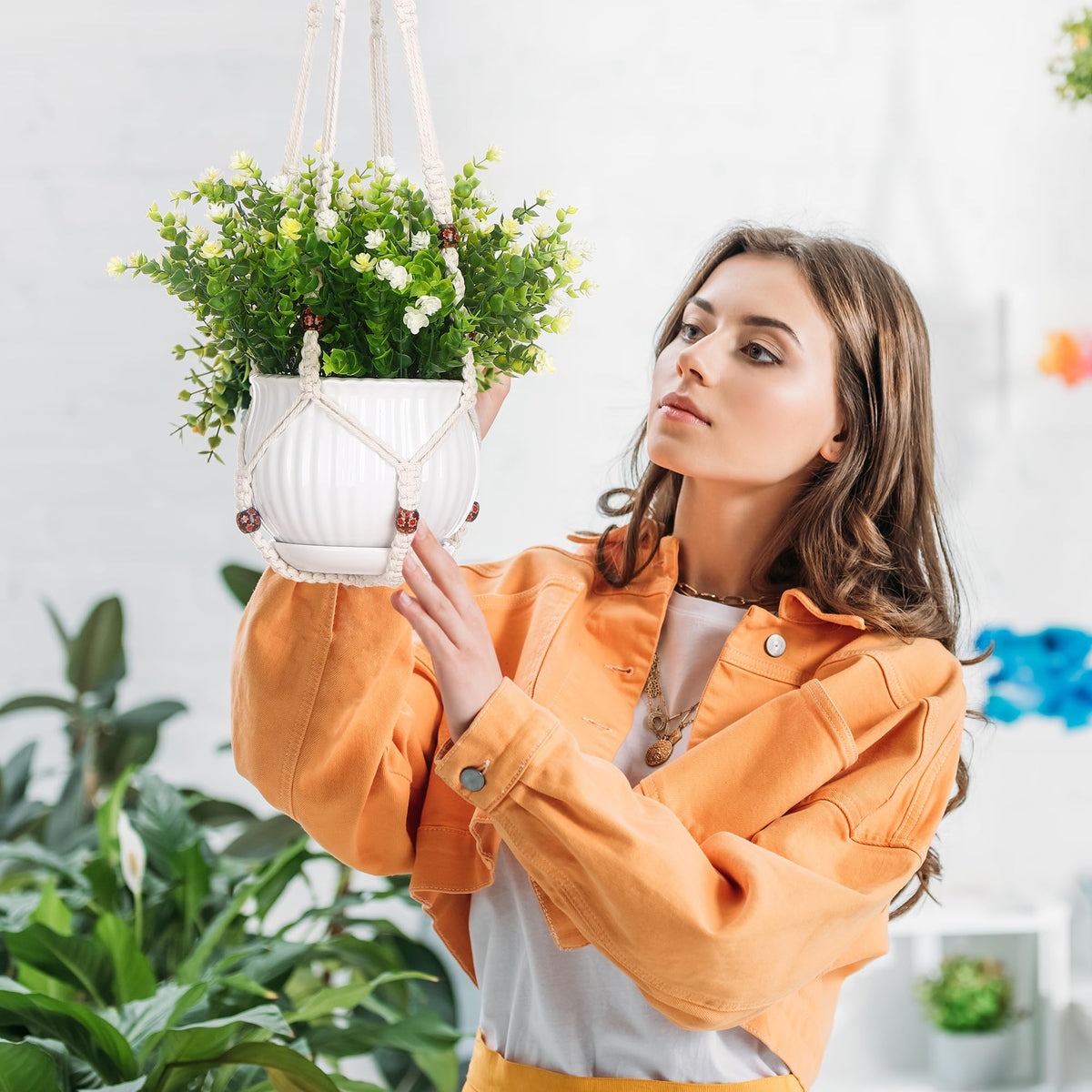 YIBOT macrame hanger indoor-outdoor setup shows versatile placement in living spaces.