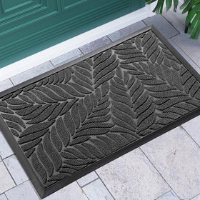 Yimobra front door mat shows a leaf-pattern groove to trap mud and dust.