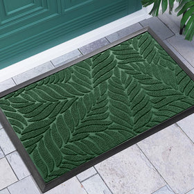 Yimobra groove-pattern door mat showing leaf-like grooves that trap debris and reduce mess at the entry.