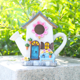 Yinns Bird House hand-painted finish brightens your yard