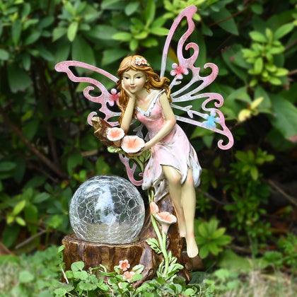Yiosax garden fairy statue with cracked glass ball glowing at night for outdoor spaces