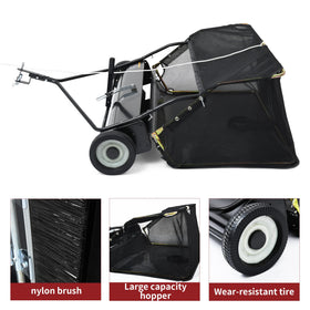 YITAMOTOR lawn sweeper hopper open for debris collection and quick dumping.