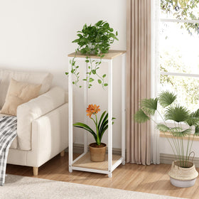 YIZAIJIA metal-frame plant shelf provides sturdy support for vibrant potted plants.