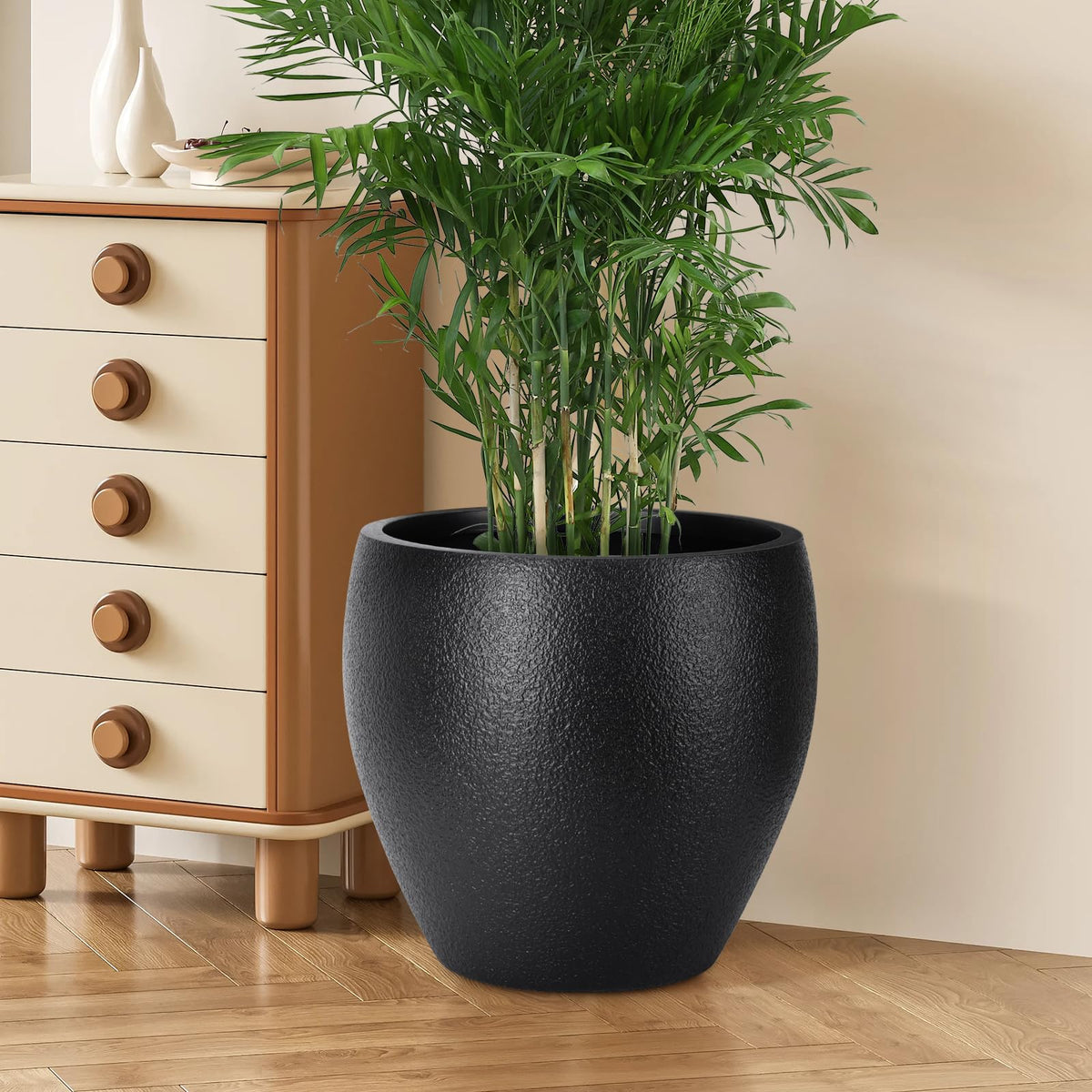 YNNICO indoor garden setup with large planters complements home decor.