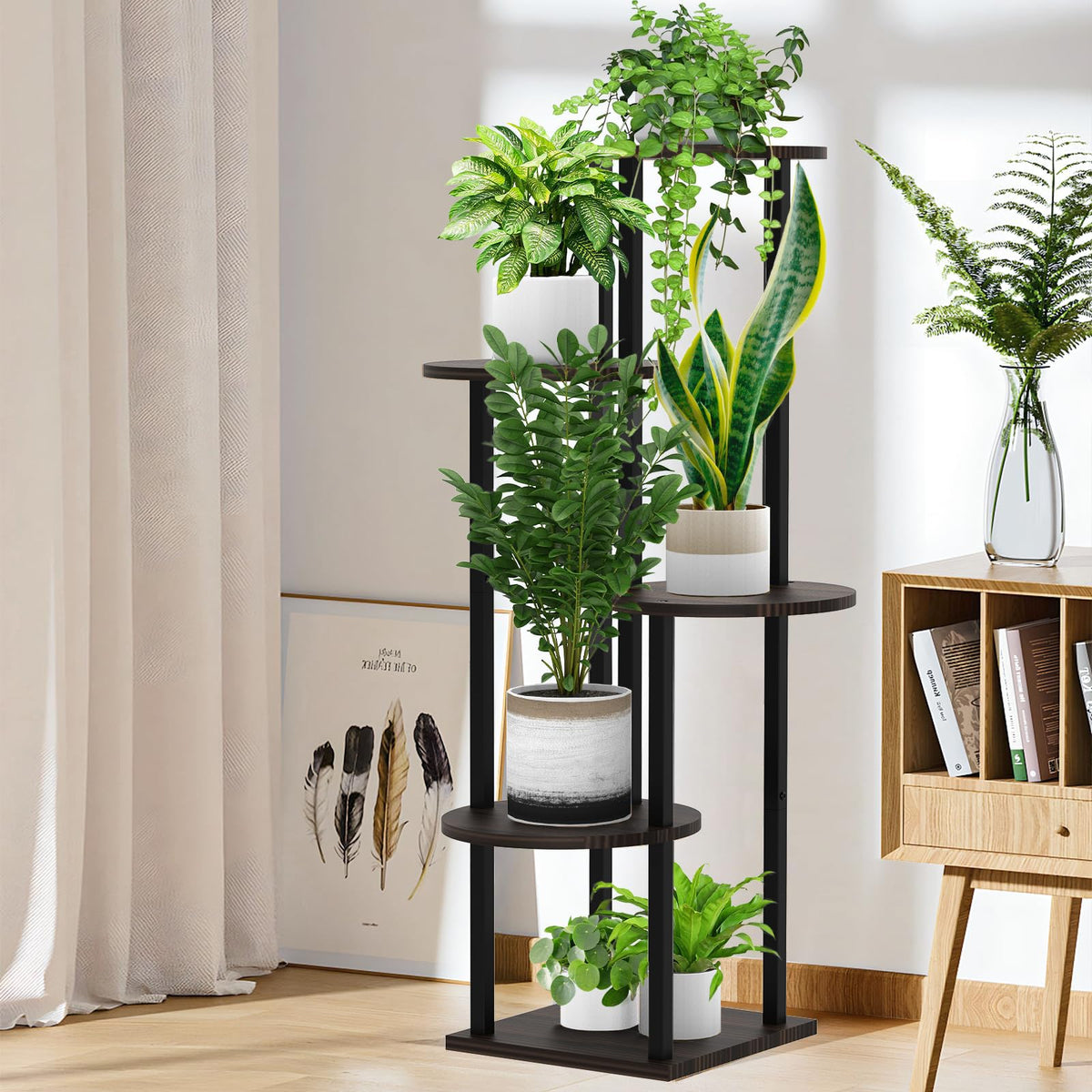 YOCOMEY living room setup uses space efficiently for plants and photos.