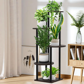 YOCOMEY living room setup uses space efficiently for plants and photos.