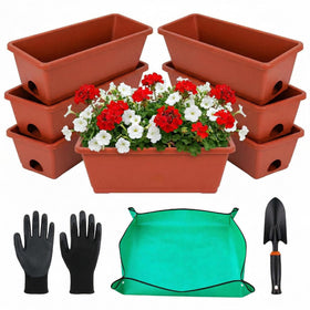 Yokodaza planters with saucers keep surfaces clean and prevent spills.