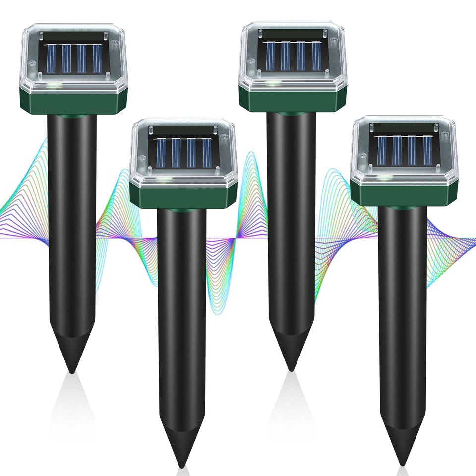 YOOYHHOME mole repellent solar-powered 4-pack in sunny garden protecting lawn