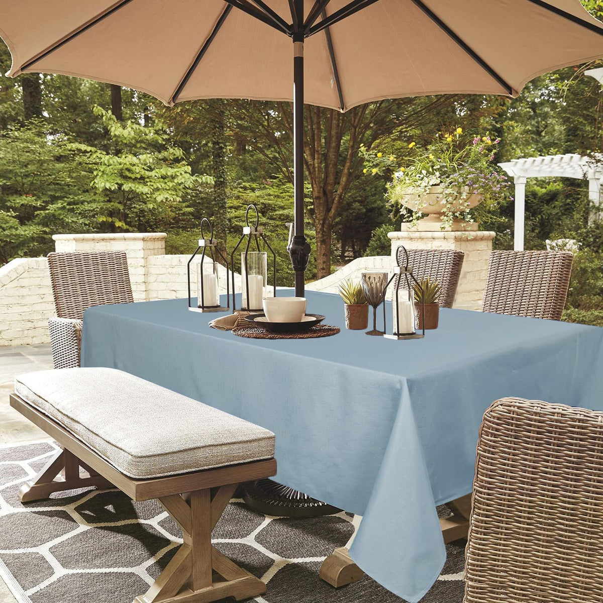 Youngseahome umbrella-hole blue-fog tablecloth protects tabletops during outdoor dining.