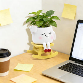 YOUOIVIA rocking-chair-face-planter mini-tabletop fits tight spaces.