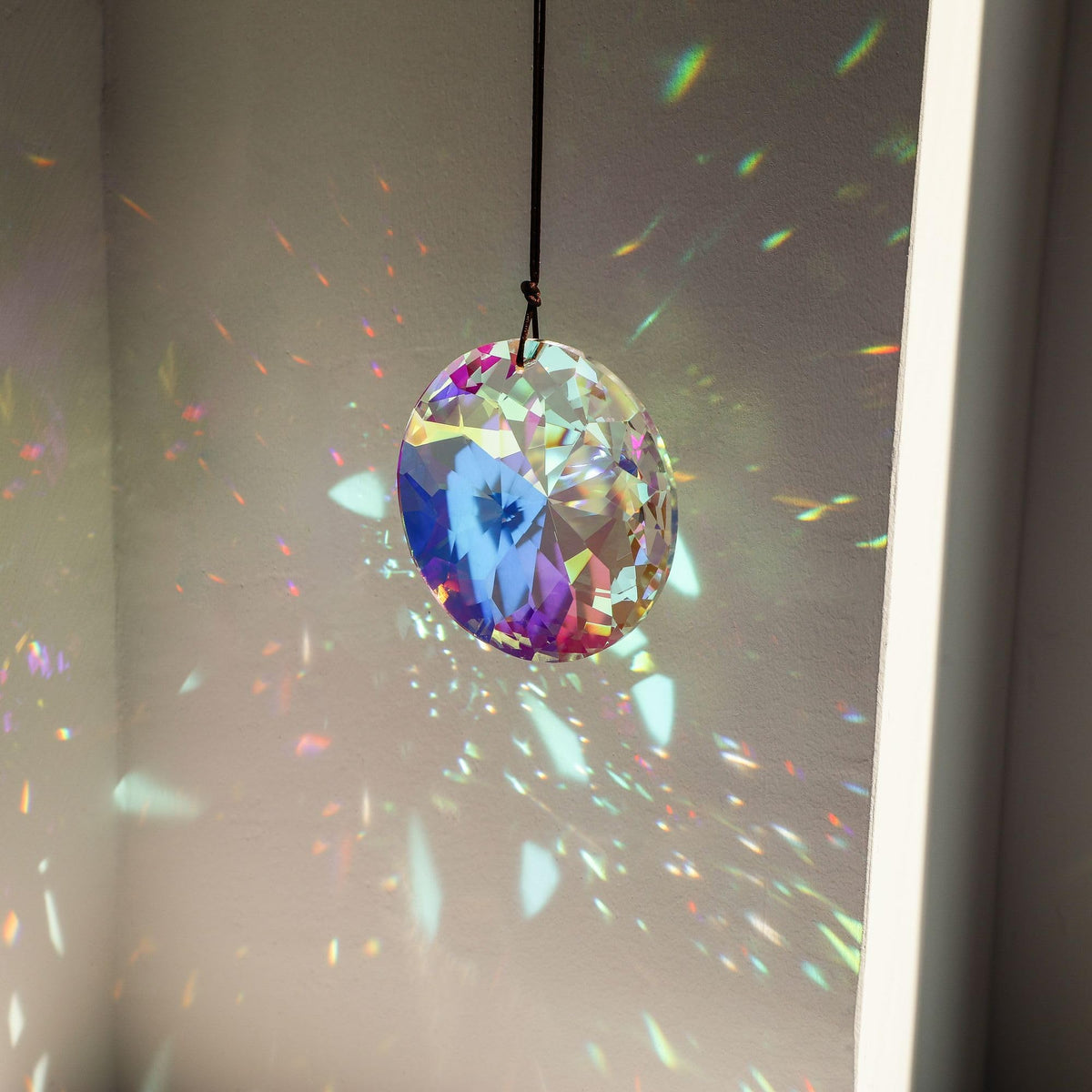 YU FENG car rearview suncatcher adds sparkle on the go.