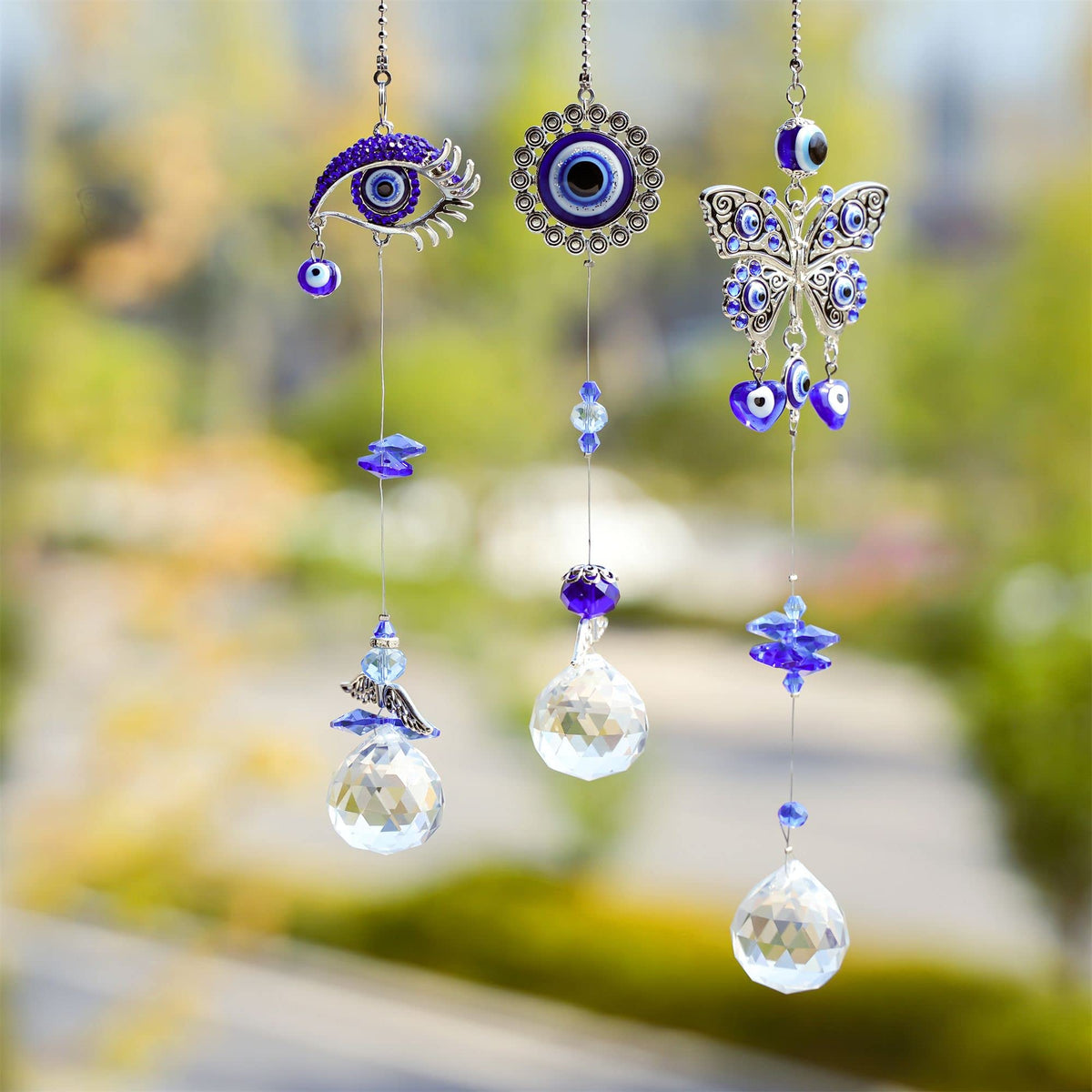 YU FENG crystal prism ball suncatcher brightens spaces with rainbows when sunlight hits.