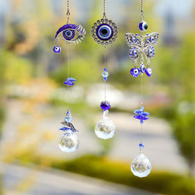 YU FENG crystal prism ball suncatcher brightens spaces with rainbows when sunlight hits.