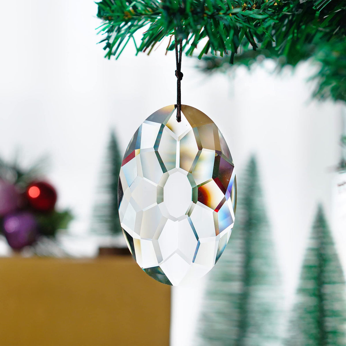 YU FENG crystal suncatcher captures sunlight with clean transparency