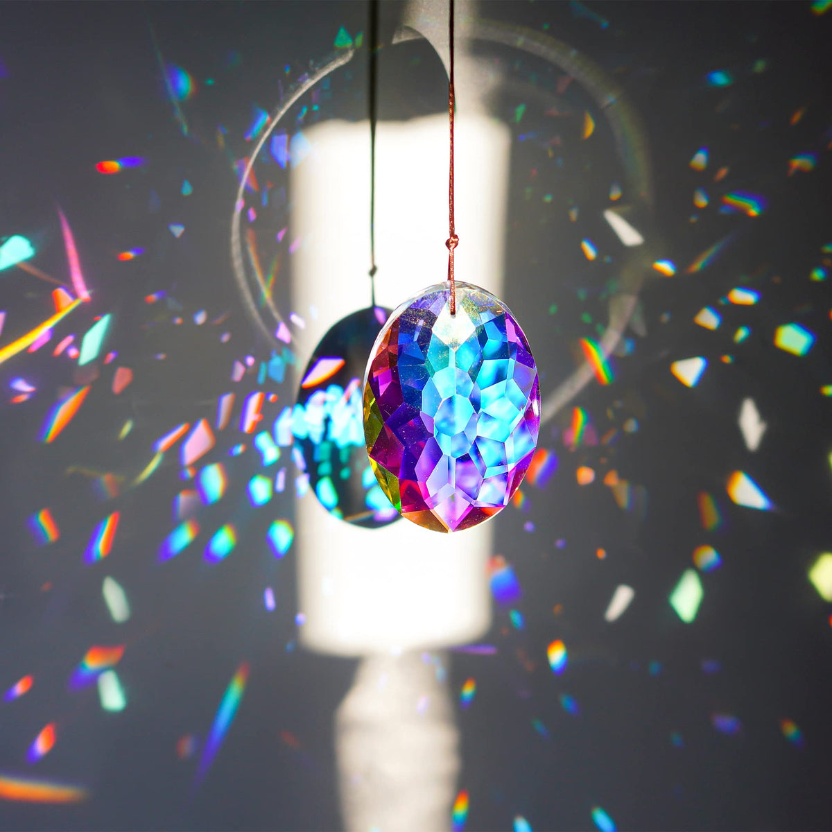 YU FENG K9 crystal prism hanging pendant adds sparkle to home decor.