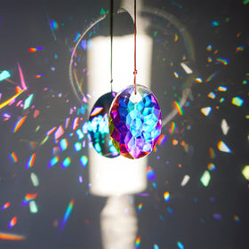 YU FENG K9 crystal prism hanging pendant adds sparkle to home decor.