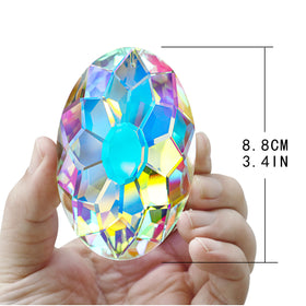 YU FENG rainbow prism suncatcher catching sunlight with multicolor light spots.
