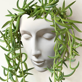 Yuccasly ceramic face vase perfect for fresh or dried flowers.