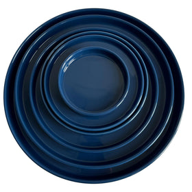Yukfona 7-inch blue ceramic plant saucer bottom view highlights sturdy base.