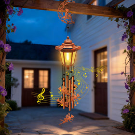 Yulloyello night glow from solar wind chimes in garden