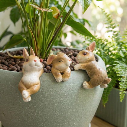 Yungeln rabbit garden decor ornament for pots adds whimsy to outdoor planters.