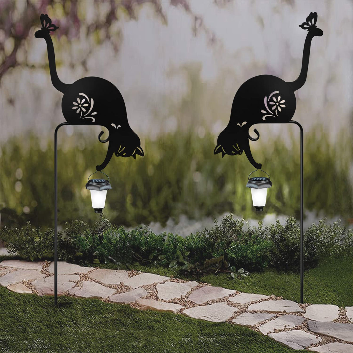 YY-Ladybug cat holding solar lantern stake close-up of weather-ready metal finish