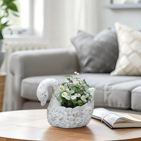 Z² BellaDecor Swan Planter on patio enhances outdoor spaces