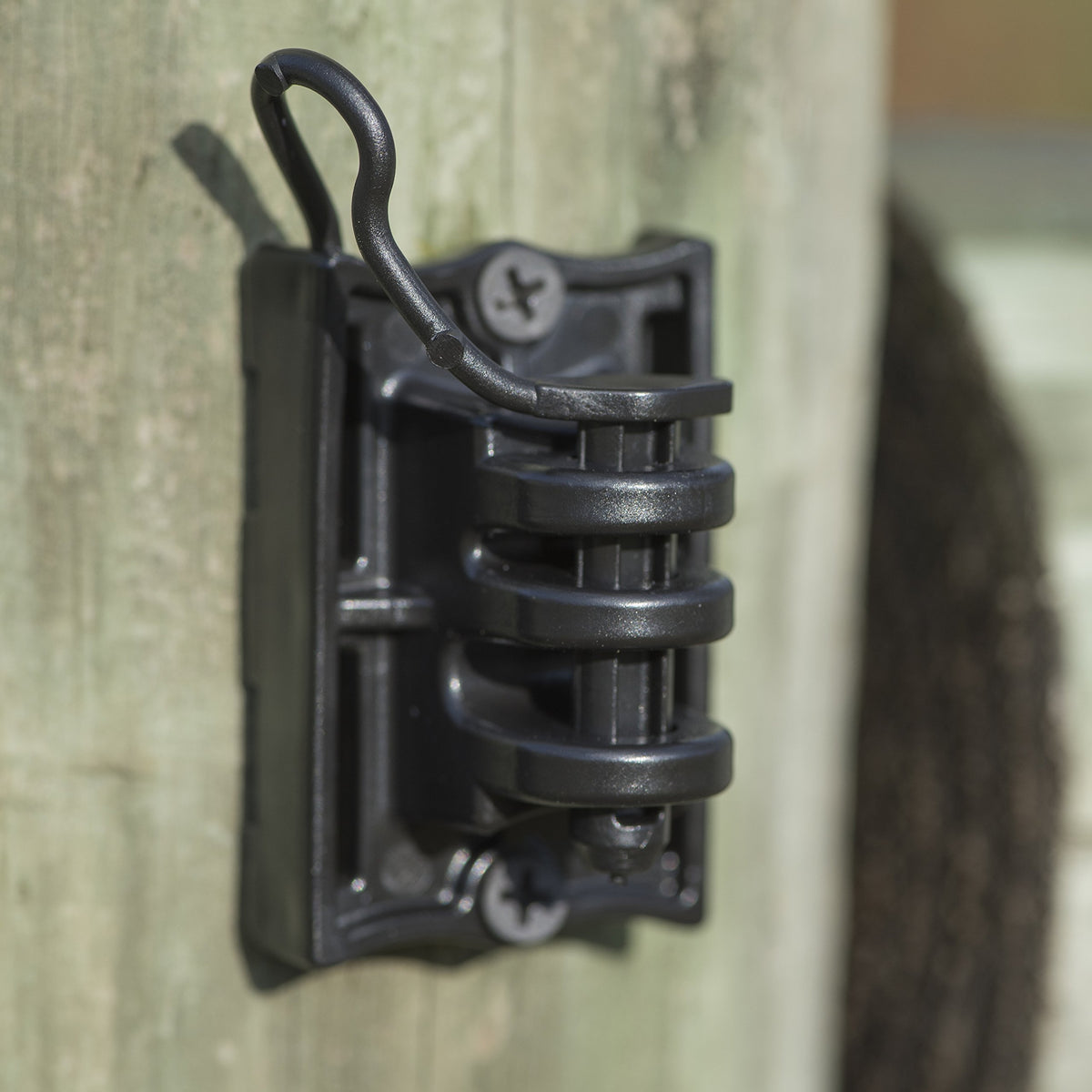 Zareba Wire-release Pin insulator showing easy release for quick maintenance