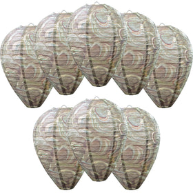 ZeeDix 8-pack dark wasp nest decoy hanging outdoors over a patio.