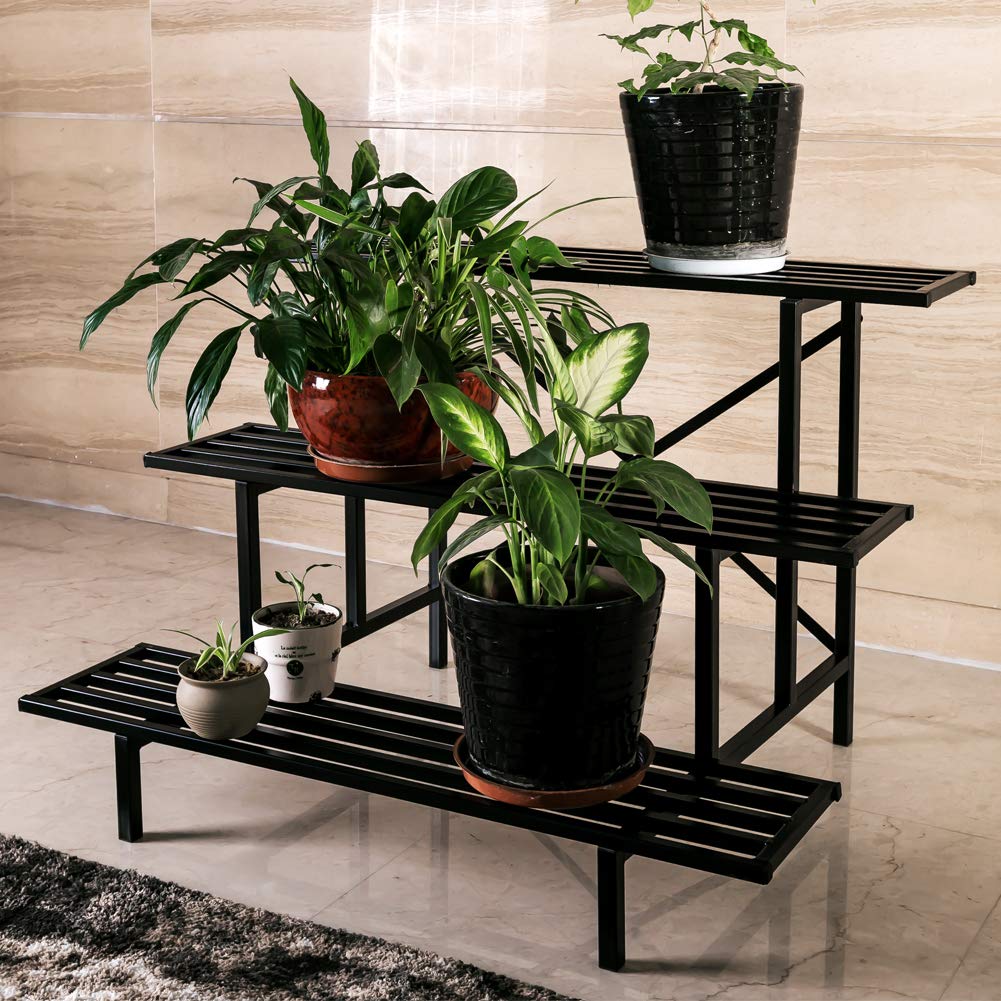 Zhongma plant stand in indoor display with multiple pots.