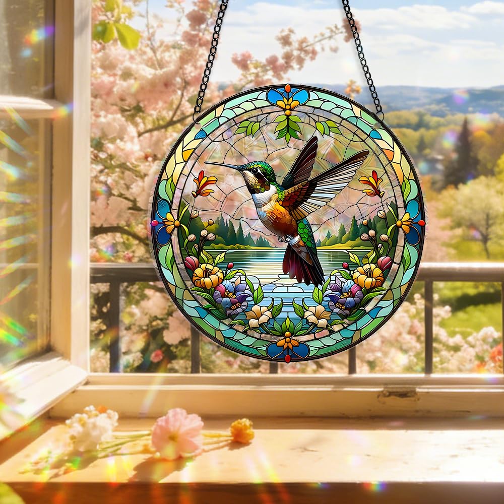 Zhuoyaju acrylic rainbow suncatcher panel catching sunlight to create colorful reflections.