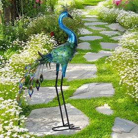Ziowio iron peacock garden sculpture, textured finish adds depth to flower beds.