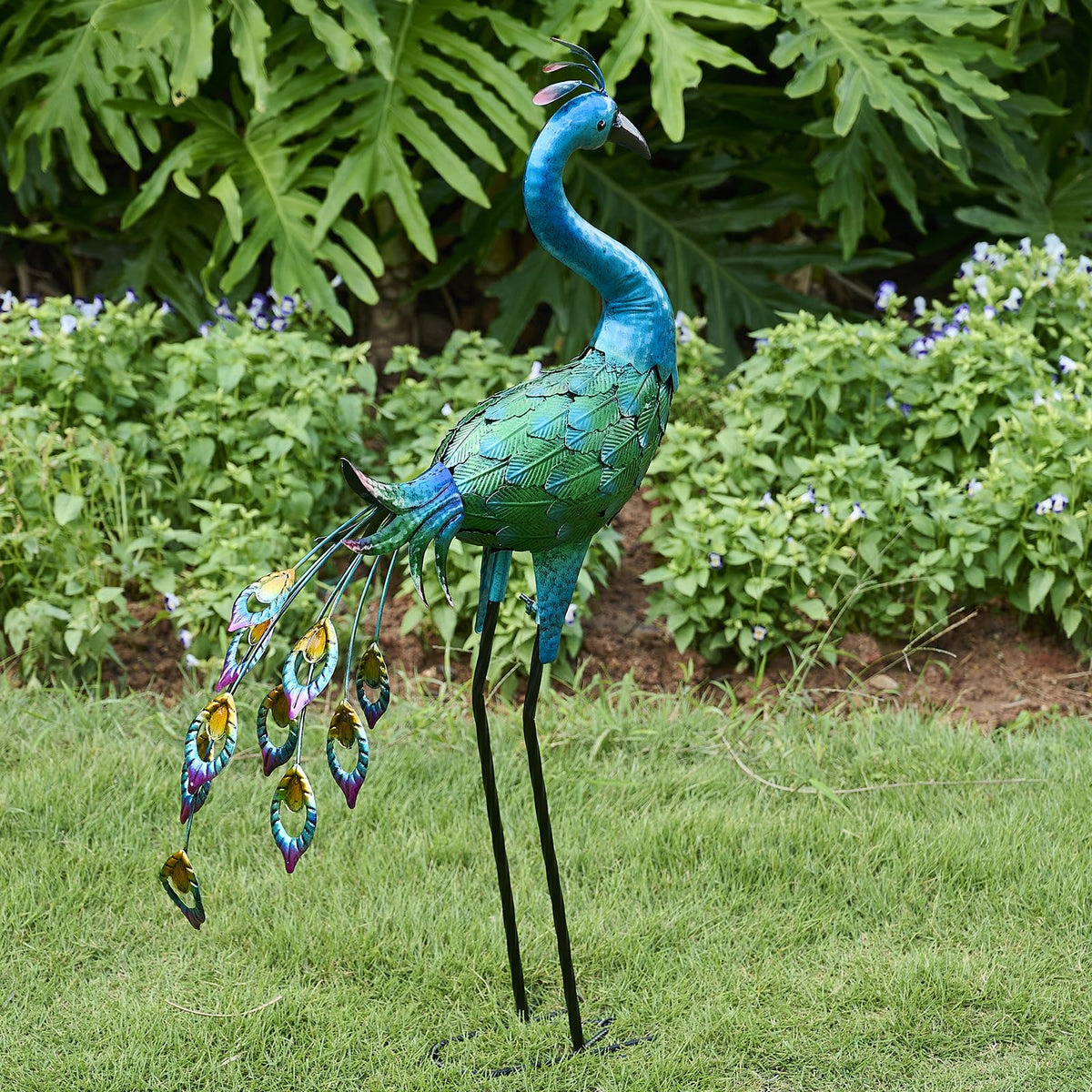 Ziowio metal peacock statue, front view, ideal yard focal point with weatherproof finish.