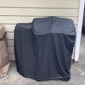 ZJYWSCH Durable grill cover for outdoor use.