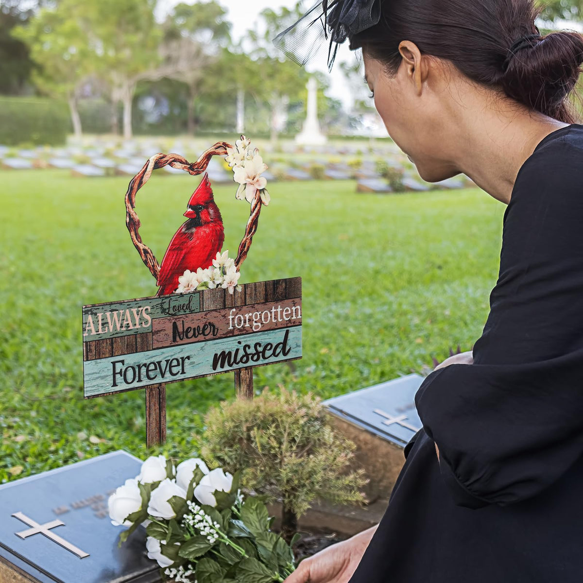 Zonon Cardinal grave stake on a lawn garden setting for memorial display