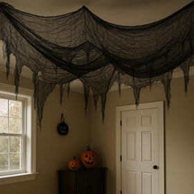 Zonon netting draped over a tent provides an outdoor insect barrier.