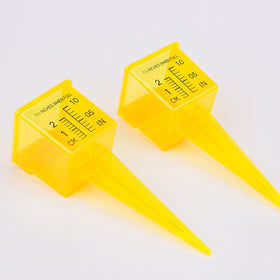 Weather-resistant plastic ZORZA rain gauge for outdoor use.