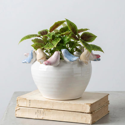 ZSHAWN stoneware planter with birds on rim brightens shelves.