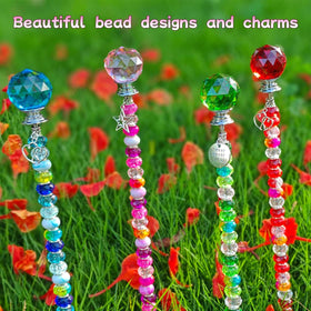ZSlactp crystal balls create twinkling focal points in fairy gardens.