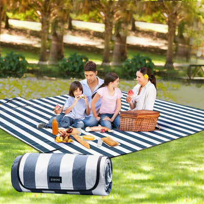 ZUBOND picnic blanket fully laid out on grass for a family gathering.