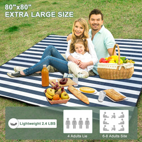 ZUBOND picnic blanket waterproof top layer keeps sand dry at the beach.