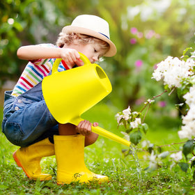 ZXJ 64oz capacity watering can reduces refills during gardening tasks.