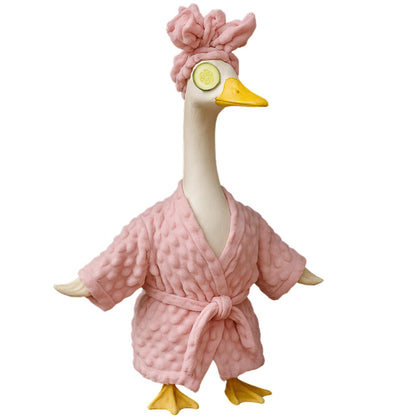 Zxsluktv goose outfit on a 23-inch statue adds cozy curb appeal with a plush pink bathrobe.